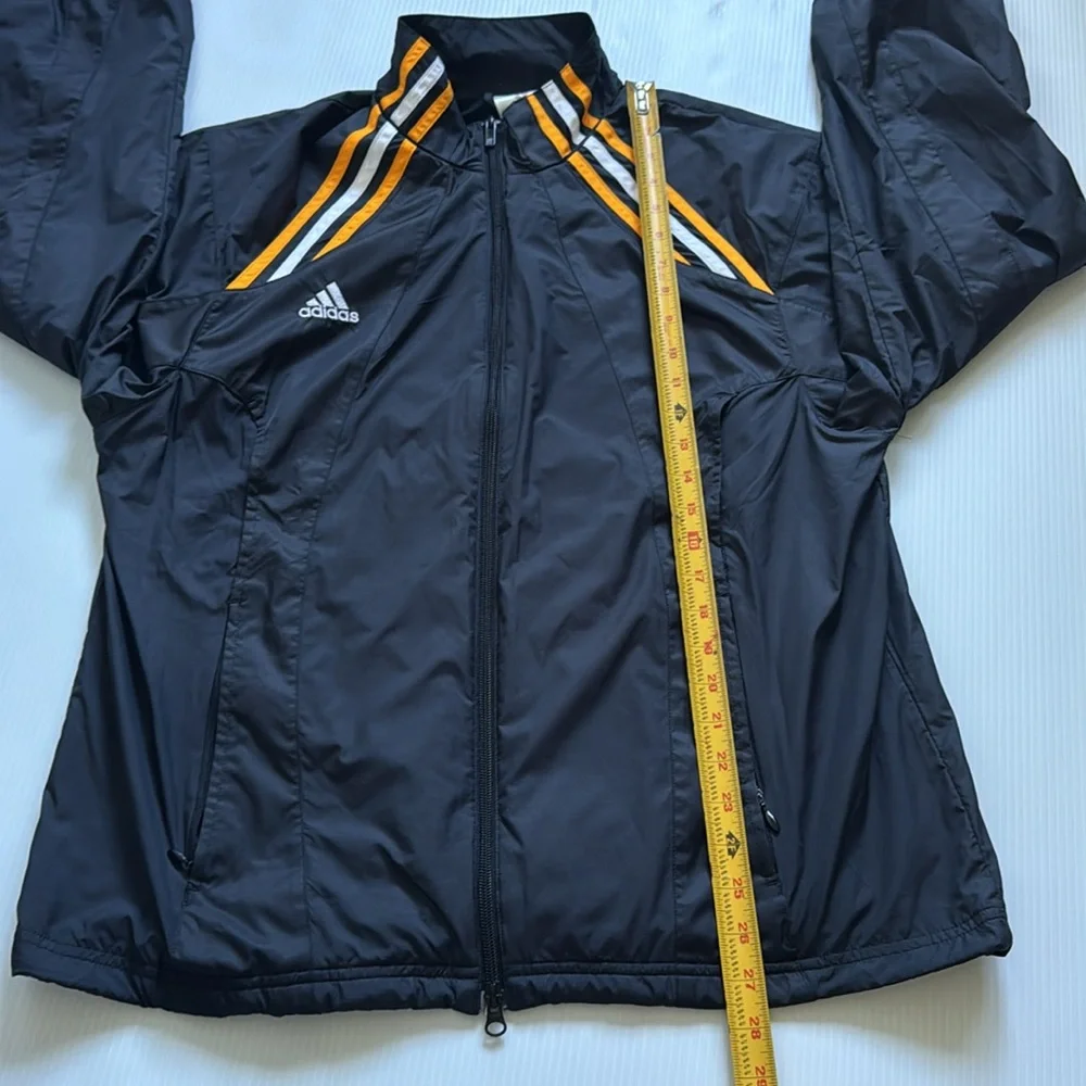 Vintage Adidas black, orange & white windbreaker jacket.  Men’s size small
